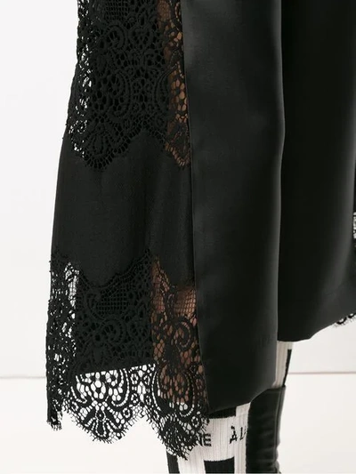 Shop À La Garçonne Lace Detail Cropped Trousers In Black
