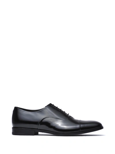 Shop Prada Black Brushed Leather Oxford Shoes In Nero
