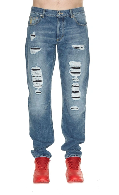 Shop Alexander Mcqueen Ripped Jeans In Blue Washed