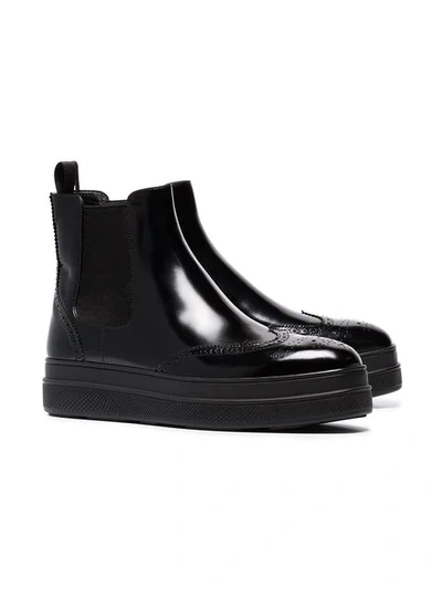Shop Prada 45 Leather Flatform Chelsea Boots In F0002
