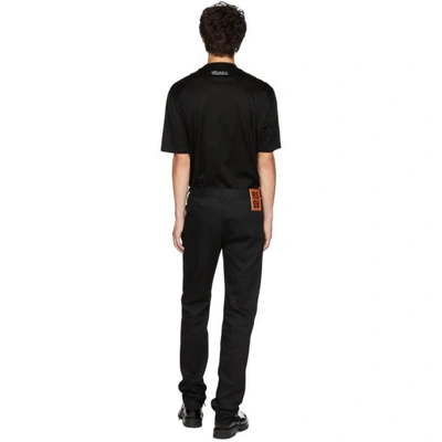 Shop Raf Simons Black Patches Regular Fit Jeans In 09935 Blk/o