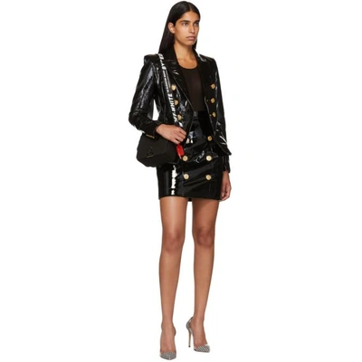 Shop Balmain Black Patent Leather Button Skirt In Noir C0100