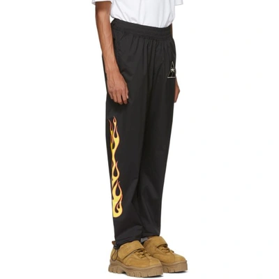 Shop Palm Angels Black Palms And Flames Lounge Pants In 1088 Blk/mu