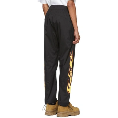 Shop Palm Angels Black Palms And Flames Lounge Pants In 1088 Blk/mu