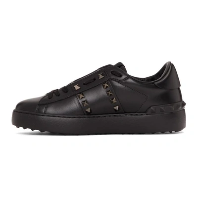 Shop Valentino Black  Garavani Rockstud Untitled 11 Sneakers In 0no Black