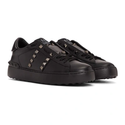 Shop Valentino Black  Garavani Rockstud Untitled 11 Sneakers In 0no Black