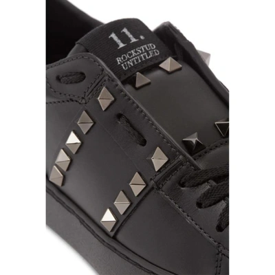 Shop Valentino Black  Garavani Rockstud Untitled 11 Sneakers In 0no Black