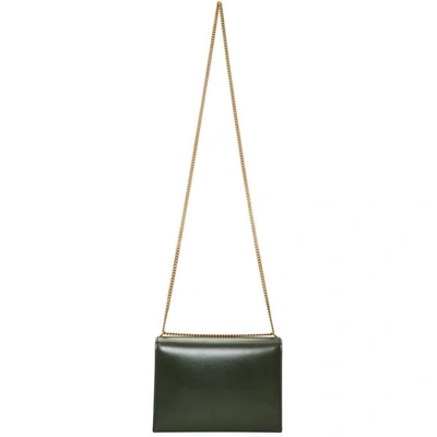 Shop Saint Laurent Green Cassandra Monogramme Clasp Bag In 3085 Green