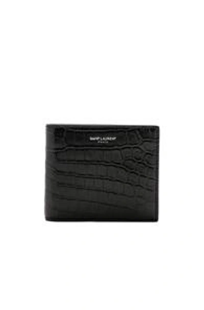 Shop Saint Laurent Matte Croc Billfold Wallet In Black