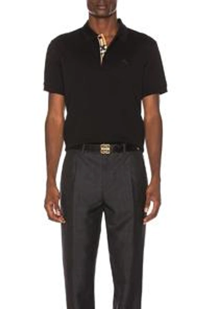 Shop Burberry Hartford Polo In Black