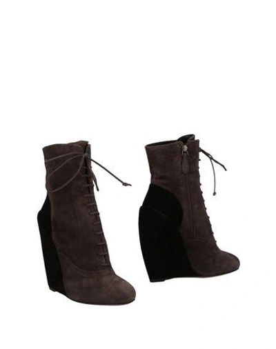 Shop Alaïa Ankle Boot In Dark Brown
