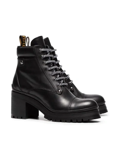 Shop Miu Miu Logo Embellished Leather Combat Boots - Black