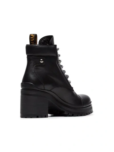 Shop Miu Miu Logo Embellished Leather Combat Boots - Black