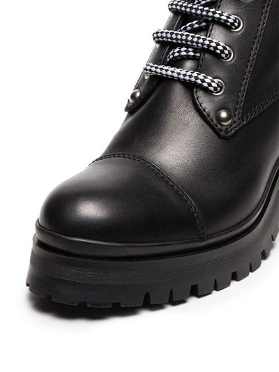 Shop Miu Miu Logo Embellished Leather Combat Boots - Black