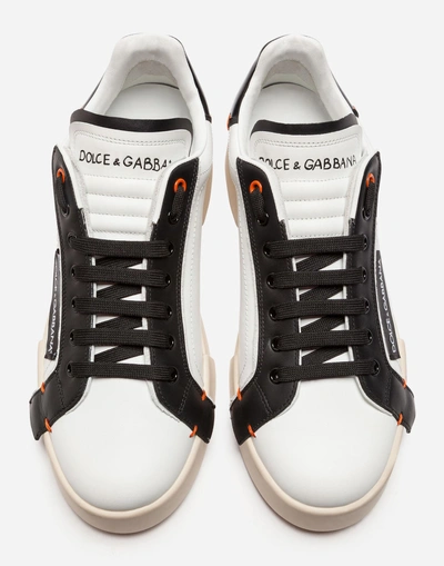 Shop Dolce & Gabbana Portofino Sneakers In Dolce&gabbana Milano Patent Nappa Calfskin In White/black