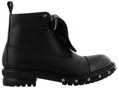 Shop Alexander Mcqueen Studded Sole Boots In Black