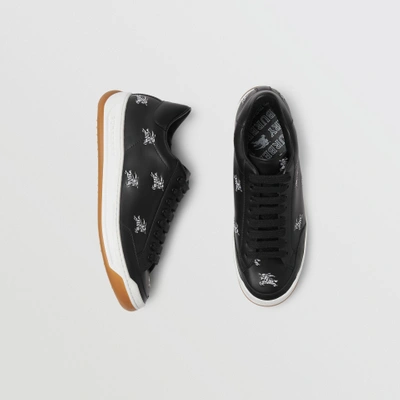 Shop Burberry Equestrian Knight Embroidered Leather Sneakers In Black