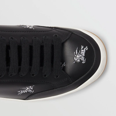Shop Burberry Equestrian Knight Embroidered Leather Sneakers In Black