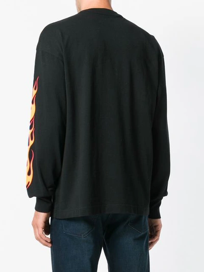 Shop Palm Angels Flame Motif Sweatshirt - Black