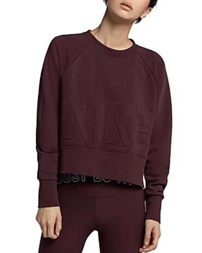 Shop Nike Versa Embossed Cropped Training Sweatshirt In Burgundy/black