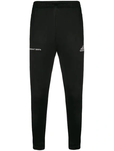 Shop Gosha Rubchinskiy X Adidas Slim-fit Track Pants In Black