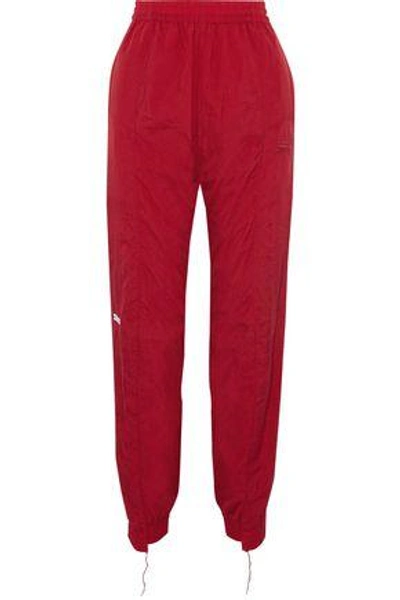 Shop Vetements Woman + Reebok Shell Track Pants Crimson