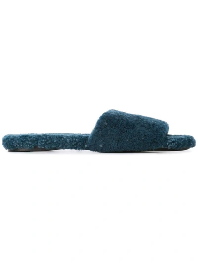 Shop The Row Shearling Slides In Blue