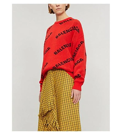 Shop Balenciaga Logo-intarsia Wool-blend Jumper In Orange/black