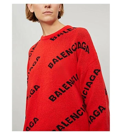 Shop Balenciaga Logo-intarsia Wool-blend Jumper In Orange/black