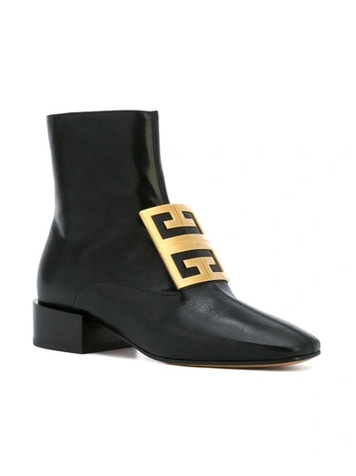 Shop Givenchy Logo Embellished Ankle Boots In Black