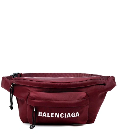 Shop Balenciaga Wheel Belt Bag In Purple