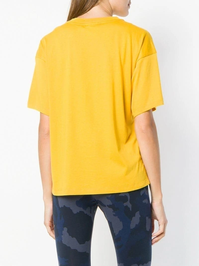 Shop Nike Front Logo T-shirt - Yellow