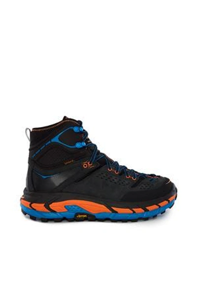 Shop Hoka One One Tor Ultra Hi Wp Sneaker In Anthracite/orange Cl