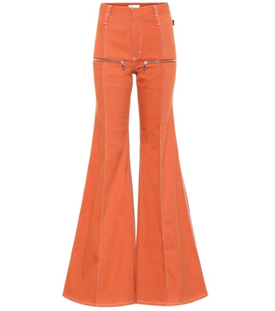 Shop Chloé High-rise Flared Jeans In Orange