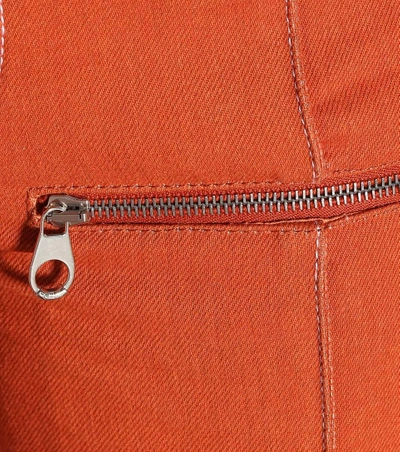 Shop Chloé High-rise Flared Jeans In Orange