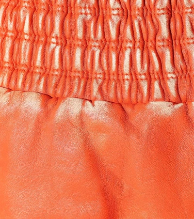 Shop Miu Miu Leather Miniskirt In Orange