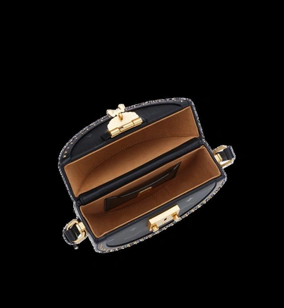 Shop Mcm Berlin Tambourine Crossbody In Odeon In Black