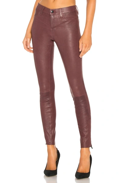 Shop J Brand Mid Rise Skinny Leather Pant In Wine