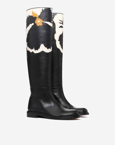 Shop Valentino Flower Motif Knee High Boot In Black