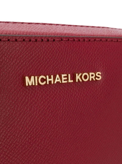 Shop Michael Michael Kors Jet Set Travel Crossbody Bag - Red