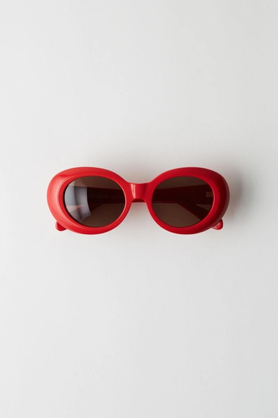 Shop Acne Studios Oval Sunglasses Red/brown