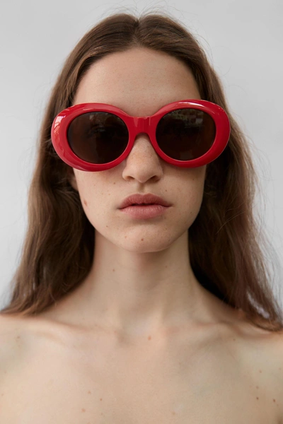 Shop Acne Studios Oval Sunglasses Red/brown