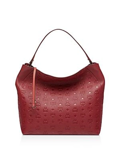 Shop Mcm Klara Monogram Large Leather Hobo In Ruby Tan Red/gold