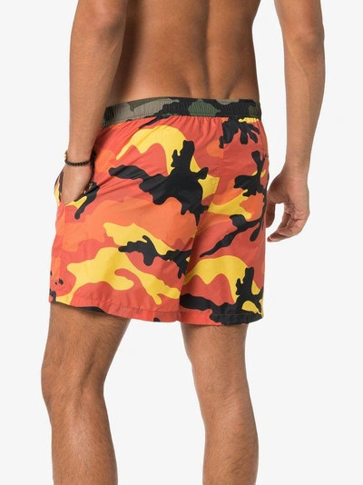 Shop Valentino Camouflage Print Swim Shorts - Yellow