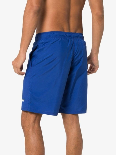 Shop Givenchy Logo Printed Swim Shorts - Blue