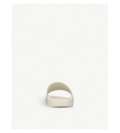 Shop Gucci Pursuit Rubber Sliders In White