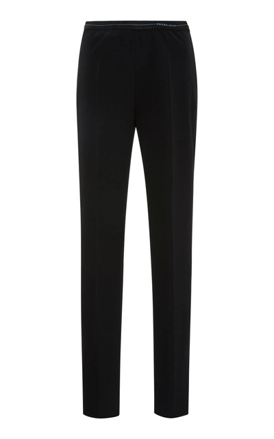 Shop Prada Stretch-knit Slim-leg Trousers  In Black