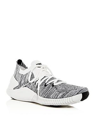 Shop Nike Women's Free Tr 3 Flyknit Low-top Sneakers In White/black