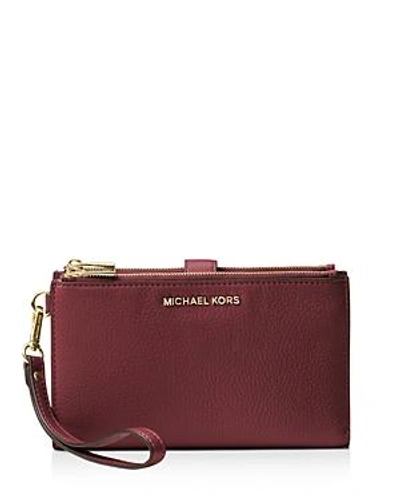 Shop Michael Michael Kors Adele Double Zip Leather Iphone 7 Plus/8 Plus Wristlet In Oxblood Red/gold