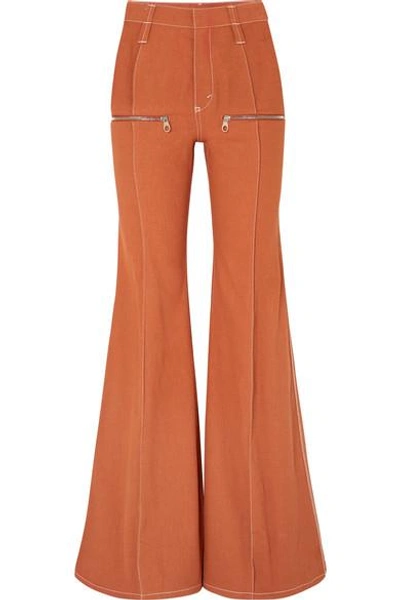 Shop Chloé Zip-embellished High-rise Flared Jeans In Orange